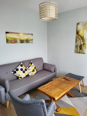 Coin salon dans l'établissement Appartement paisible en Baie de Morlaix Plougasnou