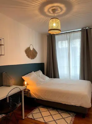 Un ou plusieurs lits dans un hébergement de l'établissement Appartement en Centre-Ville