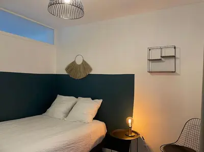 Un ou plusieurs lits dans un hébergement de l'établissement Appartement en Centre-Ville