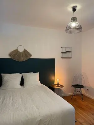Un ou plusieurs lits dans un hébergement de l'établissement Appartement en Centre-Ville