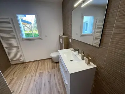 Salle de bains dans l'établissement La Grenouillère