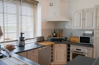 Cuisine ou kitchenette dans l'établissement Kerfloreve