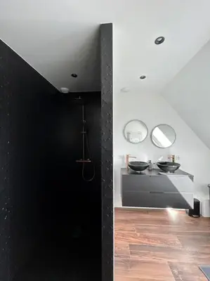 Un ou plusieurs lits dans un hébergement de l'établissement Belle maison rénovée à la plage