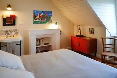 Un ou plusieurs lits dans un hébergement de l'établissement Holiday Home Locquirec by Sandy Beach