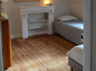 Un ou plusieurs lits dans un hébergement de l'établissement Holiday Home Locquirec by Sandy Beach