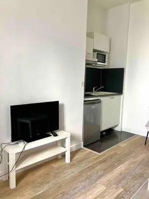Cuisine ou kitchenette dans l'établissement Les Capucins.Appartement élégant,Vue sur le jardin