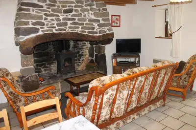 Télévision ou salle de divertissement dans l'établissement Genevrier Cottage