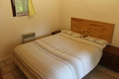 Un ou plusieurs lits dans un hébergement de l'établissement Genevrier Cottage