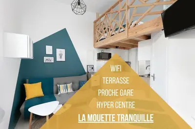 Télévision ou salle de divertissement dans l'établissement La Mouette Tranquille