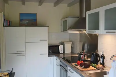 Cuisine ou kitchenette dans l'établissement Longère de charme à 3 kilomètres de la mer