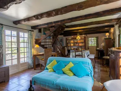 Coin salon dans l'établissement Holiday Home Chaumiere Natelliou by Interhome