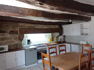 Cuisine ou kitchenette dans l'établissement chez papy plage