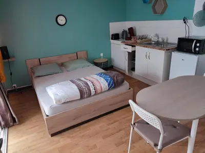 Cuisine ou kitchenette dans l'établissement Studio Madeleine 
