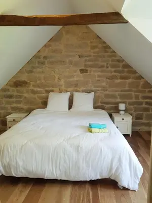 Un ou plusieurs lits dans un hébergement de l'établissement HAMEAU DE LEIGNOUA