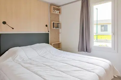 Un ou plusieurs lits dans un hébergement de l'établissement Chalet pour 4 - Résidence avec piscine
