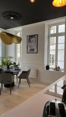 Coin salon dans l'établissement N9 APPARTEMENT DE CHARME **** MORLAIX