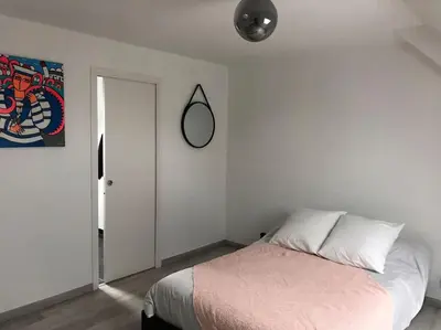 Un ou plusieurs lits dans un hébergement de l'établissement Chez mamy Odette- Appartement lumineux en bord de mer
