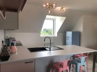 Cuisine ou kitchenette dans l'établissement Chez mamy Odette- Appartement lumineux en bord de mer