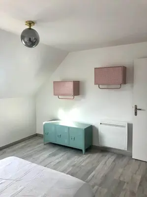 Un ou plusieurs lits dans un hébergement de l'établissement Chez mamy Odette- Appartement lumineux en bord de mer