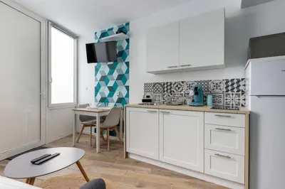 Cuisine ou kitchenette dans l'établissement Le Rêve Bleu