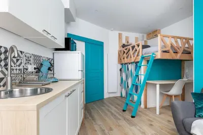 Cuisine ou kitchenette dans l'établissement Le Rêve Bleu