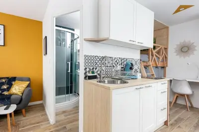 Cuisine ou kitchenette dans l'établissement La Cabane Urbaine