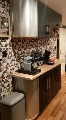 Cuisine ou kitchenette dans l'établissement LE PETIT BONHEUR