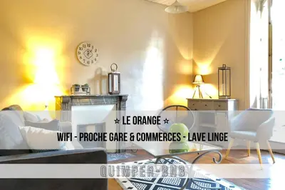 Coin salon dans l'établissement LE ORANGE - Confort - Wifi - Entre Gare et Centre