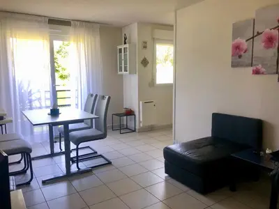 Coin salon dans l'établissement Appartement au calme nature et centre ville