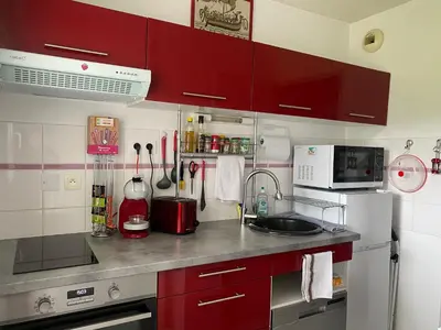 Cuisine ou kitchenette dans l'établissement Appartement au calme nature et centre ville