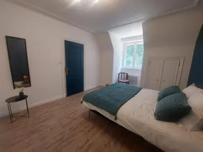 Un ou plusieurs lits dans un hébergement de l'établissement L'échappée, Chambres et Tables d'hôtes