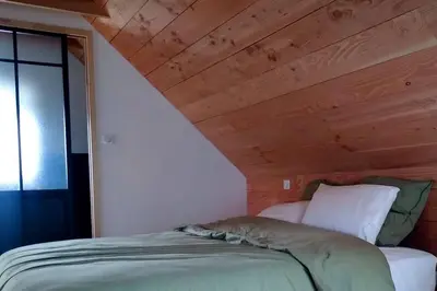 Un ou plusieurs lits dans un hébergement de l'établissement Saint-Tuge Maison de vacances