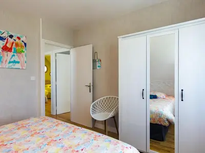 Un ou plusieurs lits dans un hébergement de l'établissement Holiday Home Maison du Venec by Interhome