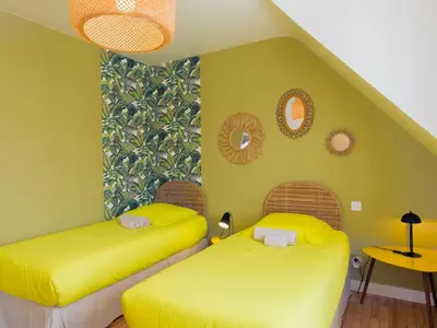 Un ou plusieurs lits dans un hébergement de l'établissement Holiday Home Maison du Venec by Interhome