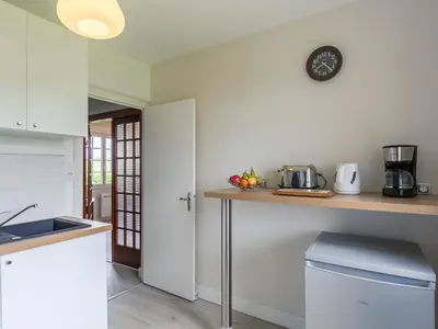Cuisine ou kitchenette dans l'établissement Holiday Home Ar Wellen by Interhome