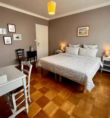 Un ou plusieurs lits dans un hébergement de l'établissement Un B&B à Loktudi