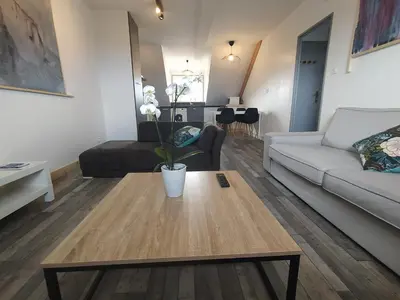 Coin salon dans l'établissement Appartement vue sur mer