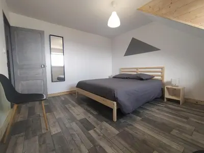 Un ou plusieurs lits dans un hébergement de l'établissement Appartement vue sur mer