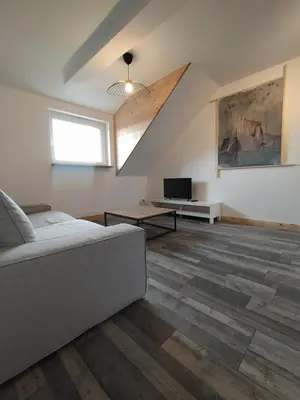 Télévision ou salle de divertissement dans l'établissement Appartement vue sur mer