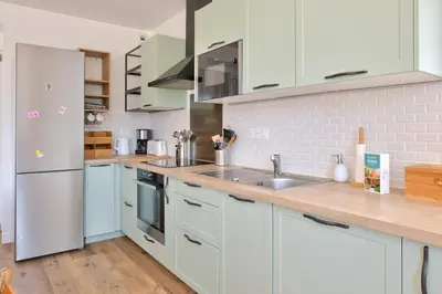 Cuisine ou kitchenette dans l'établissement Vacances et détente en famille