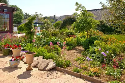 Jardin de l'établissement Maison avec piscine pour 4 adultes, 2 enfants