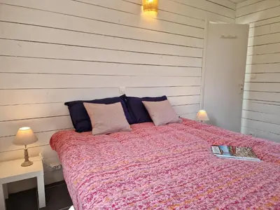Un ou plusieurs lits dans un hébergement de l'établissement Holiday Home in Locquirec near Sandy Beaches