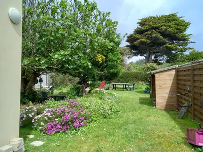 Jardin de l'établissement Maison de vacances à la plage