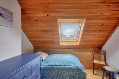Un ou plusieurs lits dans un hébergement de l'établissement Plobannalec-Lesconil centre - Maison avec grand jardin