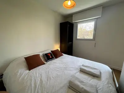 Un ou plusieurs lits dans un hébergement de l'établissement Appartement Hyper Centre