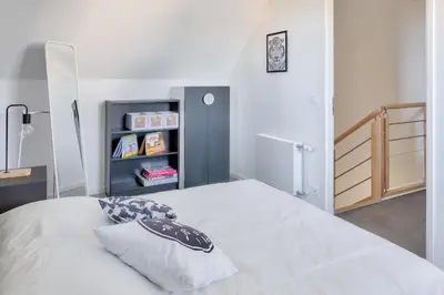 Un ou plusieurs lits dans un hébergement de l'établissement Maison moderne pour 8 - 300m plage de Pors Carn