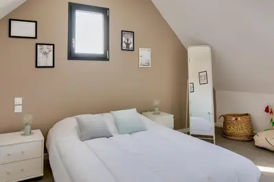 Un ou plusieurs lits dans un hébergement de l'établissement Maison moderne pour 8 - 300m plage de Pors Carn