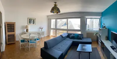 Coin salon dans l'établissement Appartement de ville et plage