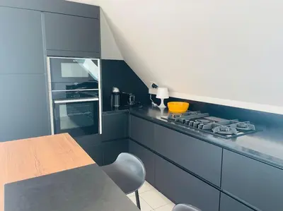 Cuisine ou kitchenette dans l'établissement Appartement lumineux et spacieux, terrasse et parking privé