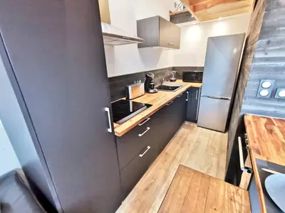 Cuisine ou kitchenette dans l'établissement LE NID DE LA TOURELLE - Wifi - Hôpital - IUT
